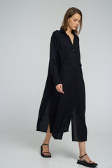 Model wearing black long sleeve button-down shirt dress