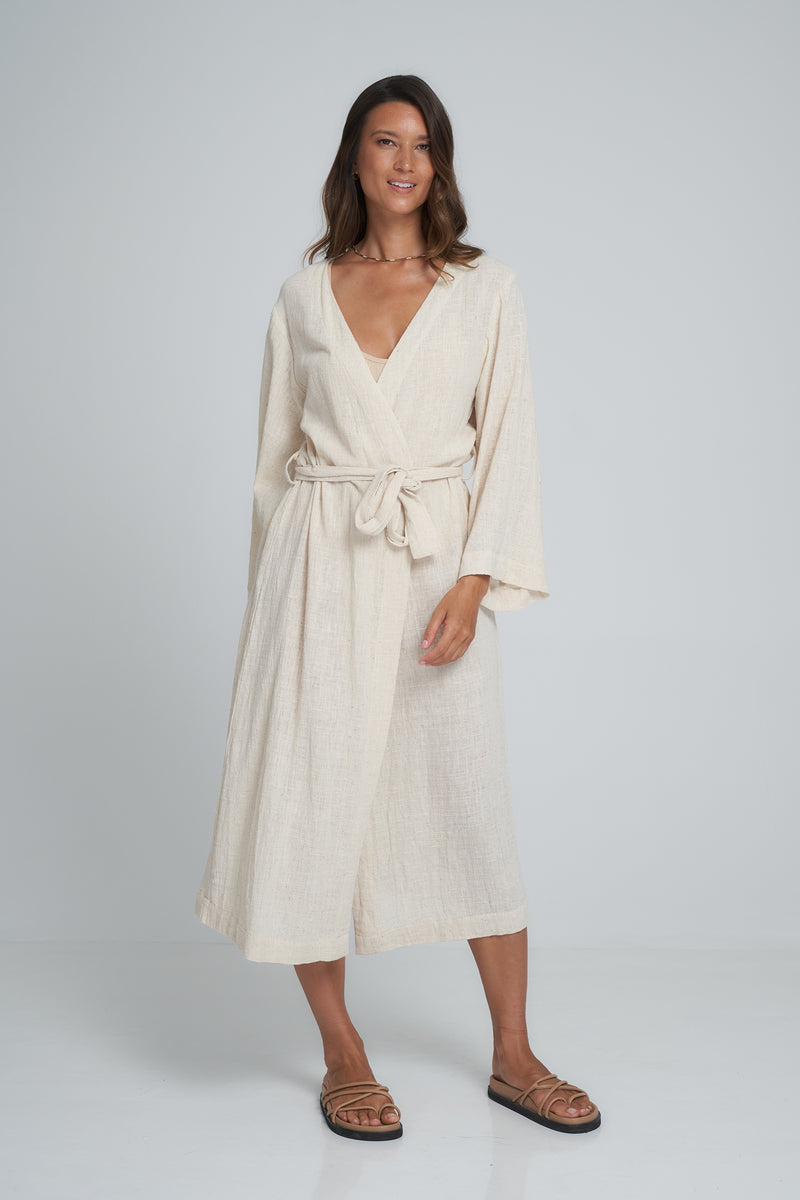 A Woman Wearing a Natural Cotton Wrap Maxi Dress