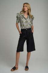 A model wearing the Dundee Shorts Black by LILYA