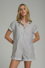 A model wearing the Eileen Cheshire Stripe Blue Playsuit by LILYA