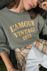 Washed green women's crew neck sweater