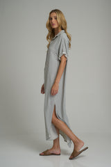 A model wearing a blue stripe maxi shirt dress