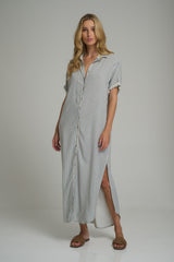 A model wearing a casual striped maxi shirt dress