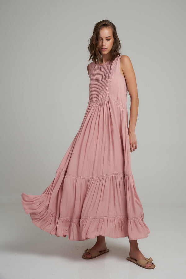 A Model Wearing an Elegant Pink Maxi Dress in Australia