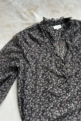 Floral pattern shirt with bell sleeves and neck frill detail