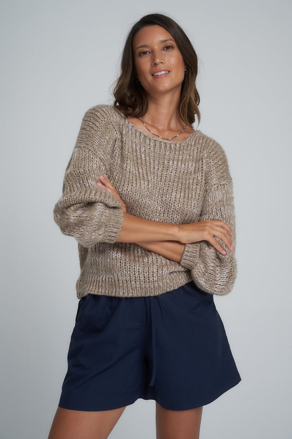 A Model Wearing a Brown Knit for Autumn