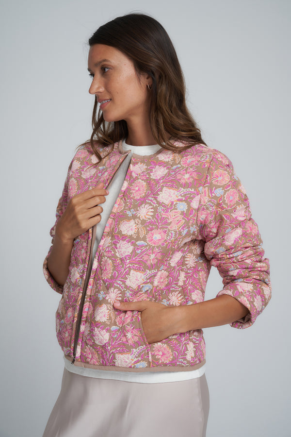 A Model Wearing a Pink Floral Cotton Jacket