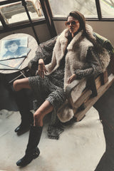 model wears romany lilya navy maxi floral skirt with 70s feel