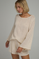 Relaxed Natural mesh top styled with summer shorts for resort dressing