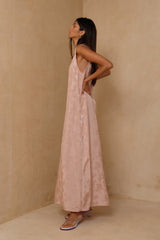Feminine maxi dress with deep V neckline and wide straps