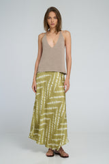Flowing silhouette of bias-cut maxi skirt