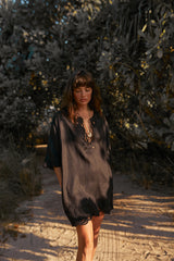 Deep V-neckline detail on Bellini Dress black linen