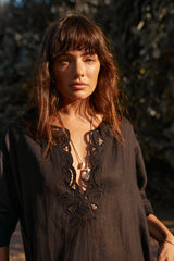 Close-up of scalloped lace trim on Bellini Dress