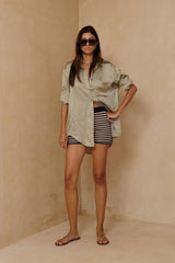 Lightweight cotton knit shorts styled for relaxed summer dressing
