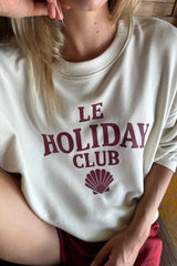 Close up image of woman wearing a comfortable oversized sweater for women over 40 and 50