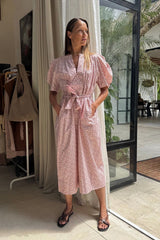 model styles the pink tie waist floral midi dress by LILYA