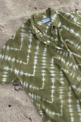 Hidden button placket detail on LILYA playsuit