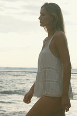 Elodie Ivory cami showing delicate lace trims and tiered body