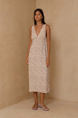 Feminine floral dress with empire waist and flowing A-line skirt