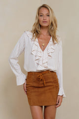 Handcrafted suede skirt close-up