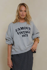 Vintage college-inspired grey marle sweater