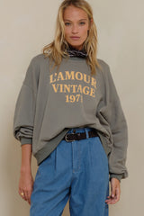 LILYA L’Amour Sweater featuring crew neckline