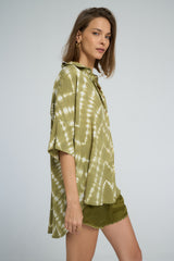 Close-up of wide draped sleeves on Georgie Shirt tie dye
