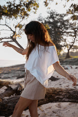 Side view showing relaxed fit and clean hemline