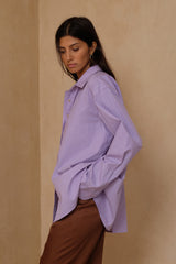 Relaxed oversized shirt with open back tie detail and curved hem