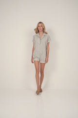 A model wearing a casual cotton playsuit