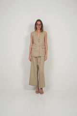 LILYA Malachite Vest styled with matching pants in sand