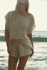 Women’s Natural mesh tank styled for resort dressing