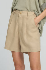 Tailored sand linen shorts with pleats and pockets by LILYA