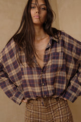 • Relaxed oversized women’s shirt with adjustable waist ties and soft structure