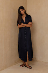 Relaxed navy maxi dress styled for day-to-evening dressing