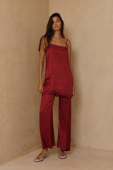 Soft satin viscose pants with slim leg and slightly flared hemline