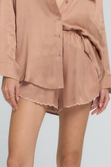 Silky shorts with curved scalloped hem by LILYA