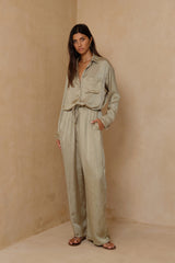 Relaxed Desert Sage pants with fluid movement and subtle sheen