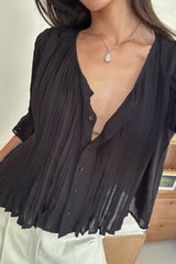 Black Sonora Top with pintuck detailing, button-through front and relaxed cropped silhouette.