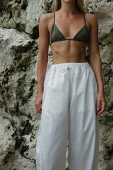 Classic triangle bikini styled with Natural resort layers