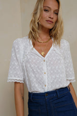 Short sleeve white blouse with scalloped trim