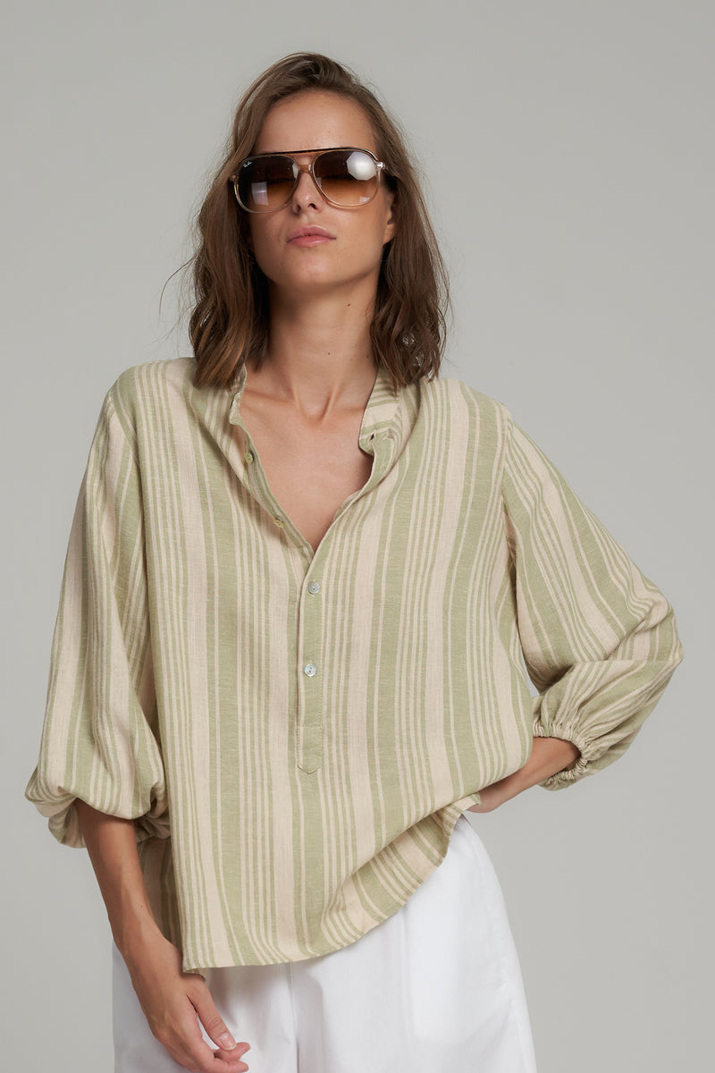 A Model Wearing a Green Stripe Linen Top for Summer