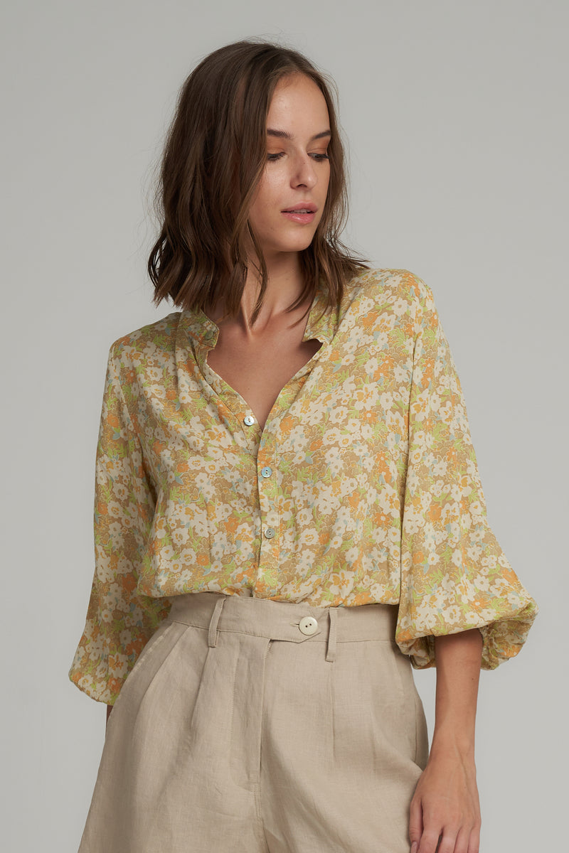 Model Wearing a Yellow Floral Long Sleeve Top