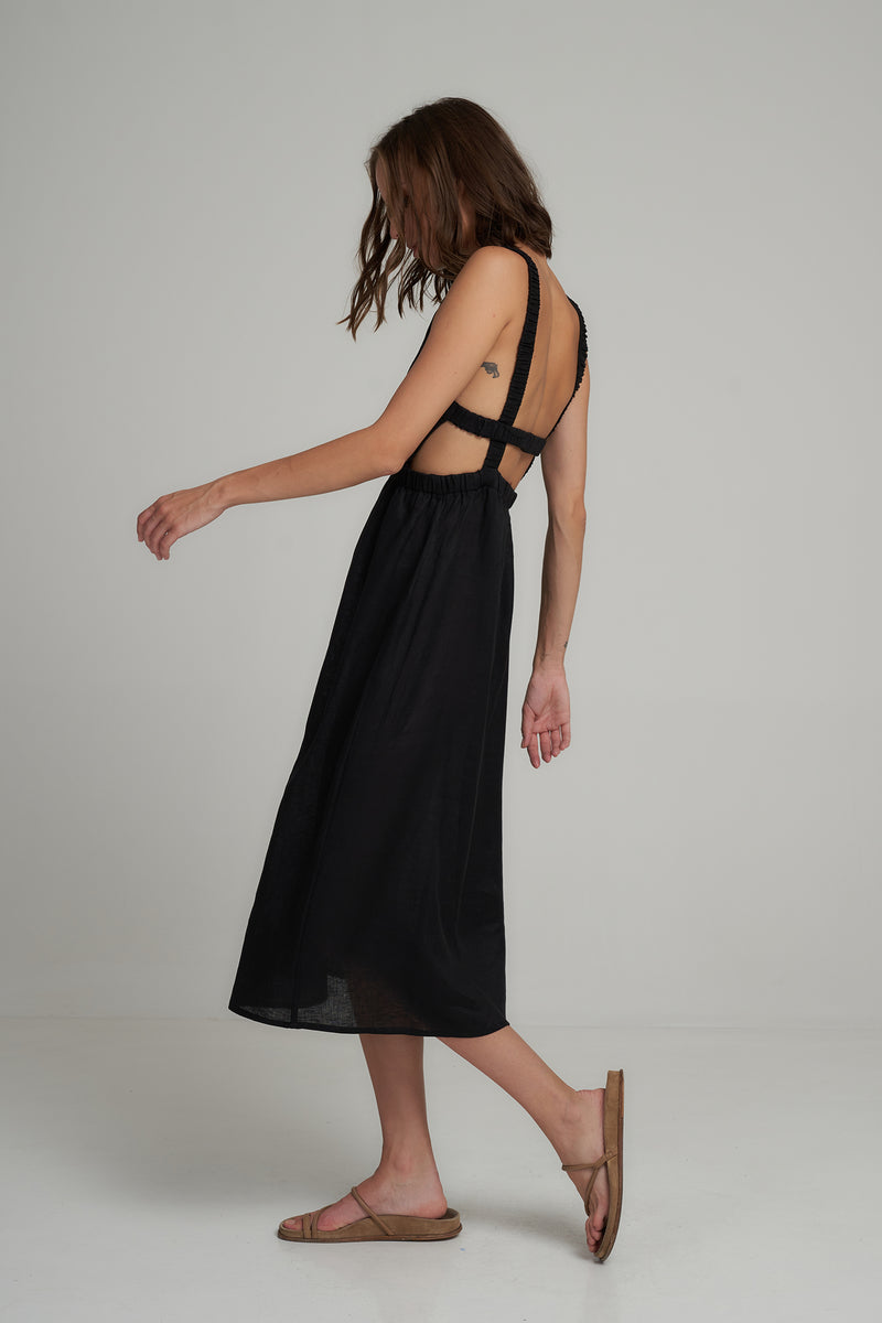 Side View of a Black Linen Midi Dress by LILYA