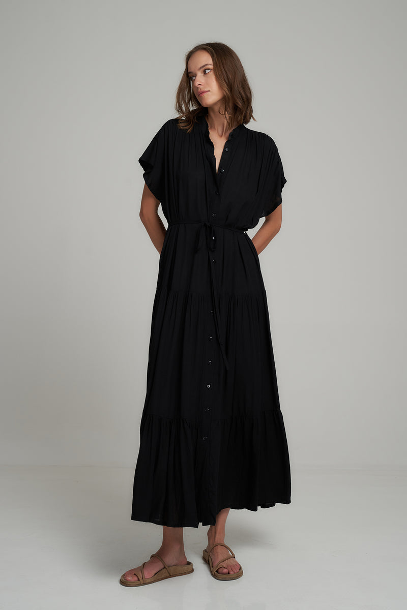 A Model Wearing a Black Maxi Summer Shirt Dress by LILYA