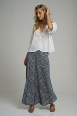 A model wearing a maxi floral skirt for winter