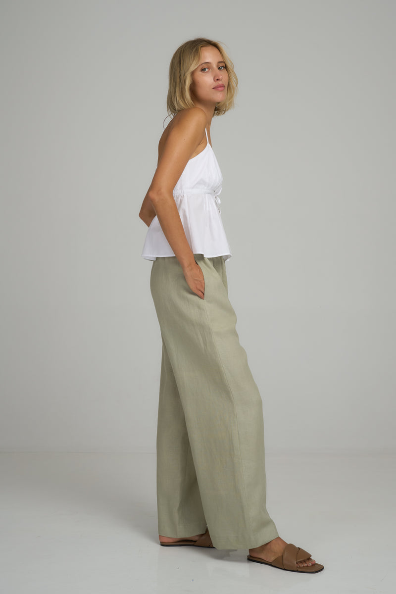 Side view of green linen summer pants