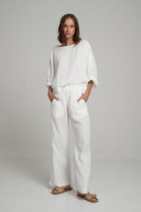 A Model Wearing White Cotton Summer Casual Pants