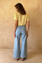 Model wears the light blue Chamomile Jeans with curved western style back pockets in stretch cotton denim. 