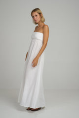 Side view of a strapless white linen summer dress